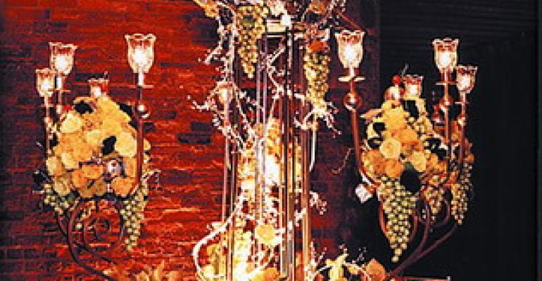 A Legendary Event Atlanta starts a threeyear Gala winning streak in 2002 with its La Dolce Vita design featuring gold and silver table linen candelbra and square silver dishes The dramatic centerpiecewith clusters of grapes lemons limes pears roses miniature callas and golden yarrowwas lit from beneath