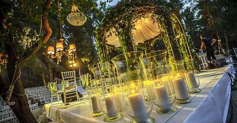 The KBY Designs team transforms Neot Kedumima Biblical landscape reserveinto three stunning settings for an unforgettable outdoor wedding featuring a 1000bulb custom chandelier Photos by Ronen Boidek and Benny Gamzo