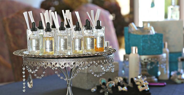 Guests create custom perfumes with Pastiche Custom Perfume