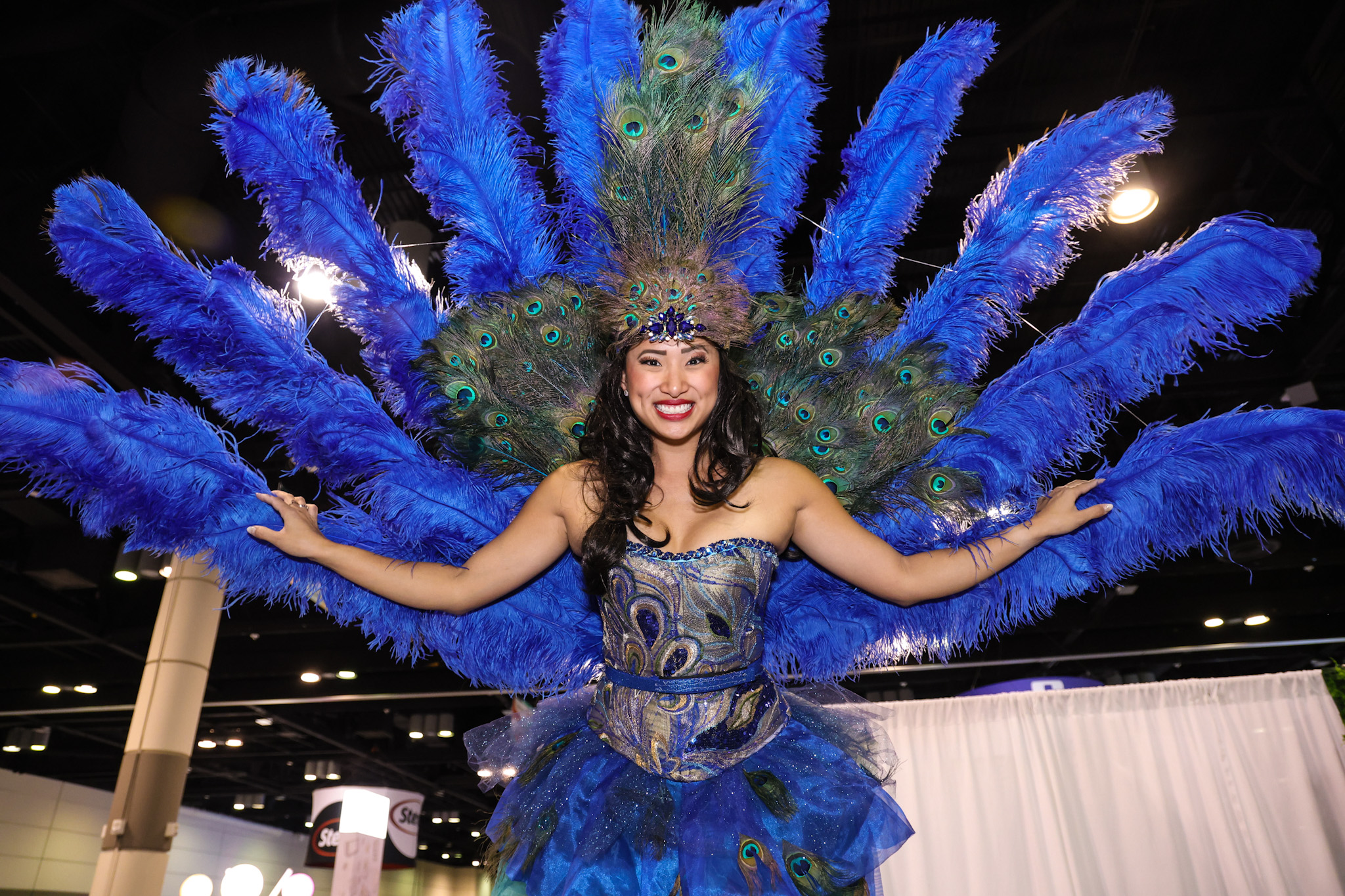 woman in peacock costume